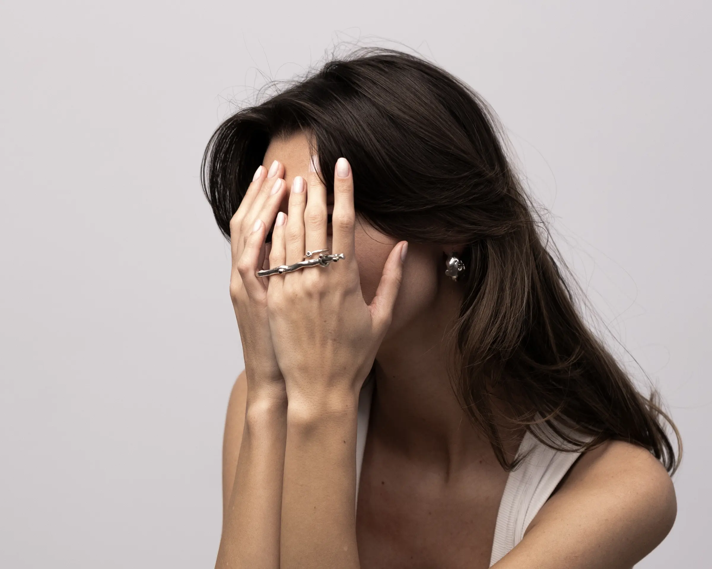 Melt ear cuff and rings worn